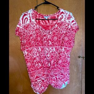 Red and white designed shirt with tie in the front